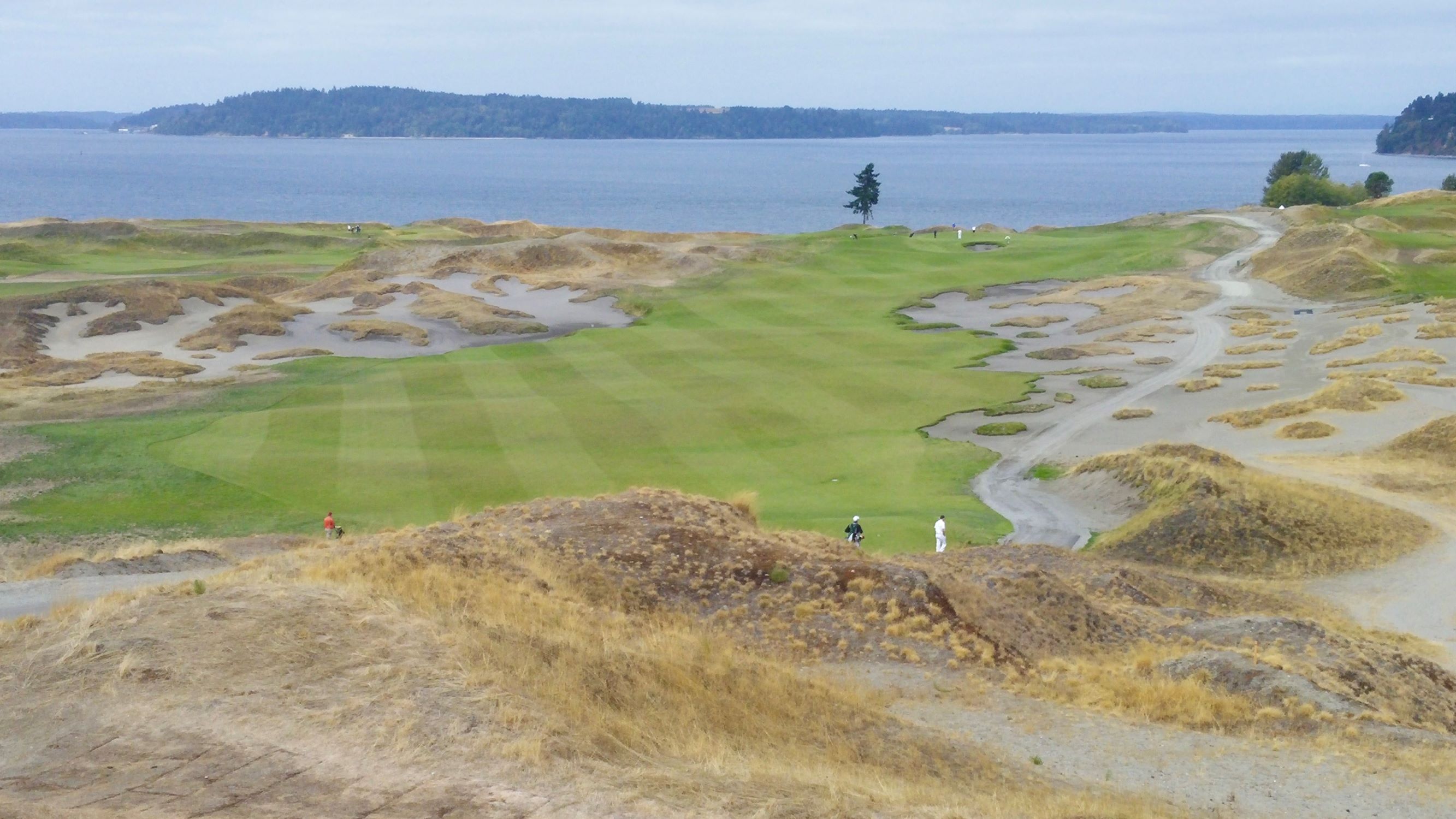 View of a golf course overlooking water